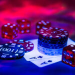 Casino abstract photo. Poker game on red background.  Theme of gambling.